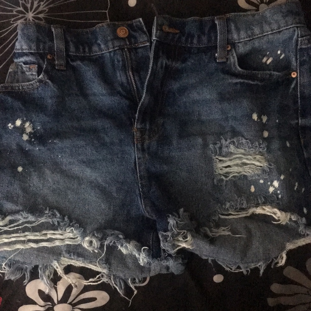 dark blue ripped jean shorts